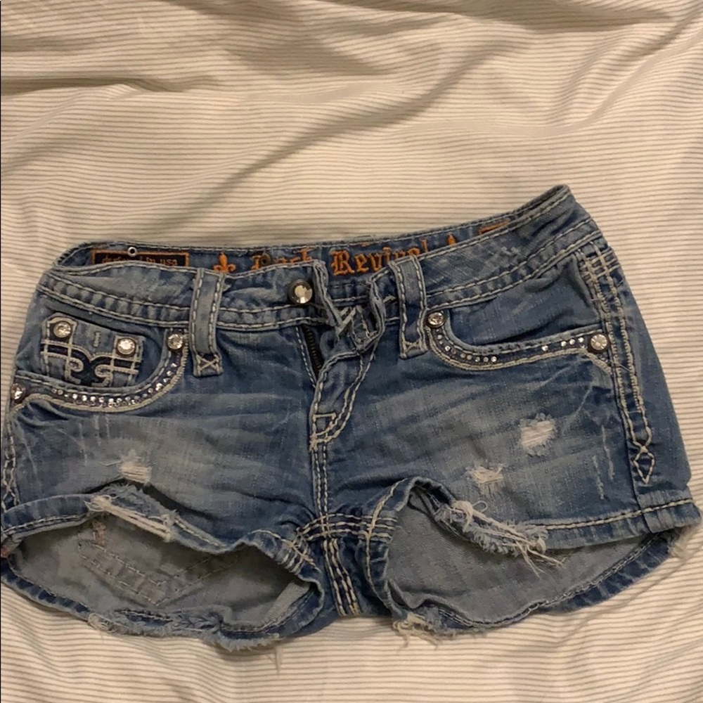Size 25 Rock Revival buckle distressed jean shorts